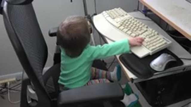 WESTMINSTER COLORADO-2016: Young Child Sitting At A Computer