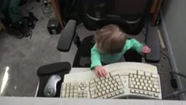 WESTMINSTER COLORADO-2016: A Person Sitting On A Computer Chair And They Are Typing