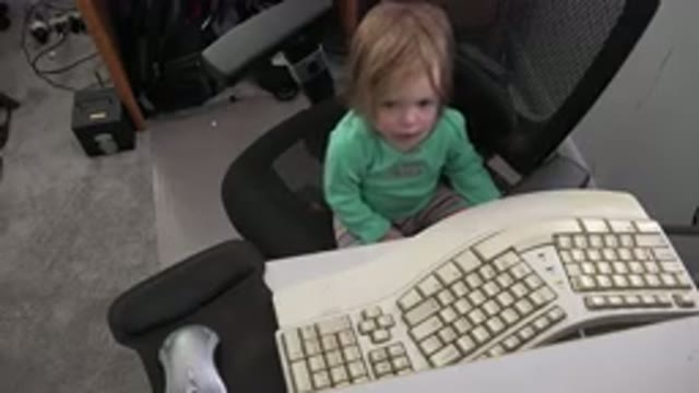 WESTMINSTER COLORADO-2016: Toddler Sitting In A Swivel Chair At A Desk With An