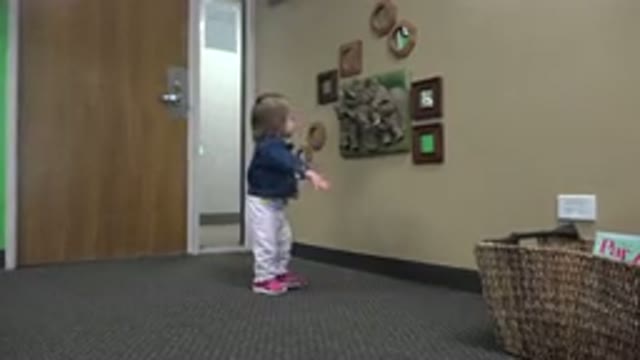 DENVER COLORADO-2016: Child Walking Little Steps In The Lobby With Decorations