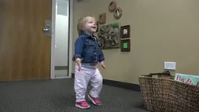 DENVER COLORADO-2016: Happy Toddler Walking a Little Bit and Putting Hands in the Air