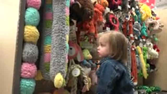DENVER COLORADO-2016: Little Blond Boy Walks Through The Store And Sees The