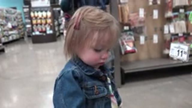 DENVER COLORADO-2016: Little Blonde Girl In A Shopping Area In A Supermarket