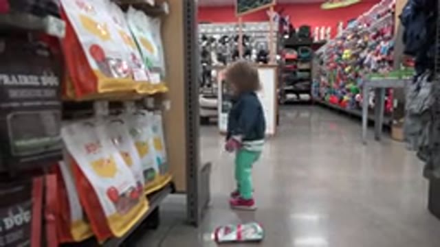 DENVER COLORADO-2016: A Toddler Exploring In A Supermarket
