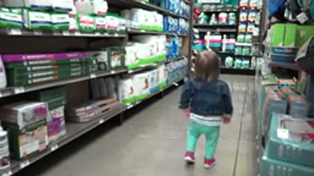 DENVER COLORADO-2016: Child Walking Alone In Market Hygiene Aisle
