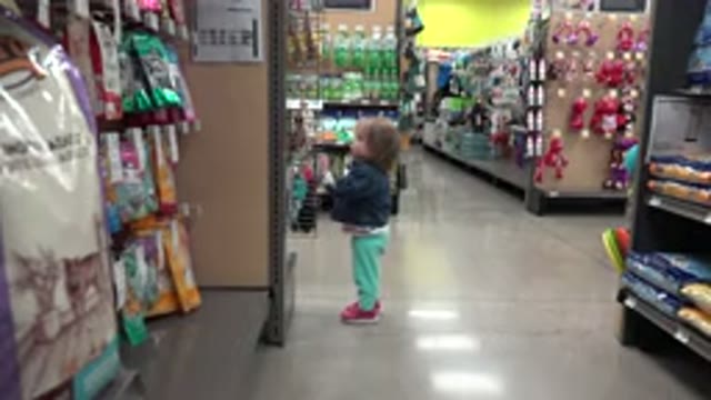 DENVER COLORADO-2016: Toddler Exploring Store End Cap with J Hook Choices