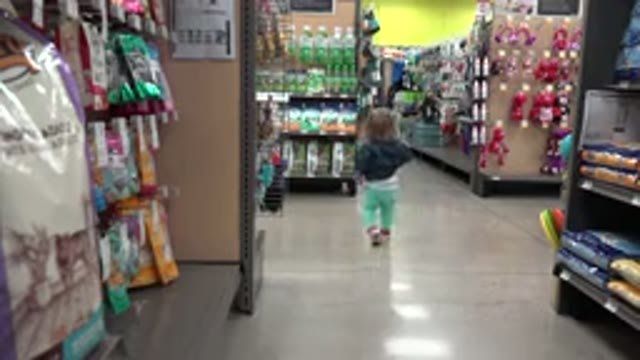 DENVER COLORADO-2016: Baby Girl Walks Around Store Alone