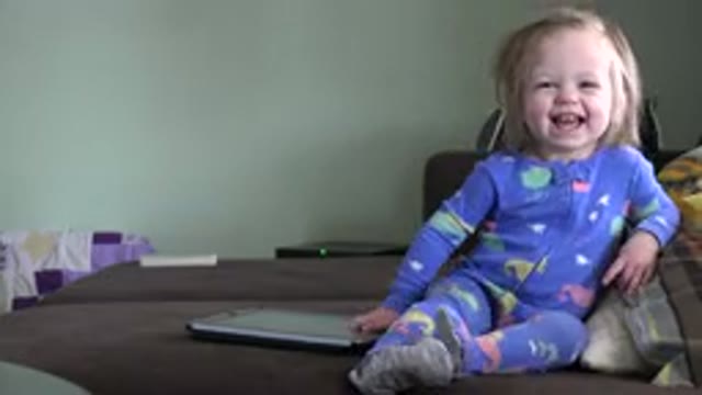 WESTMINSTER COLORADO-2016: Little Girl Laughing On The Couch