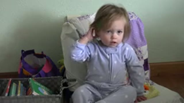 WESTMINSTER COLORADO-2016: A Girl Child Is Sitting Alone In The Bed And