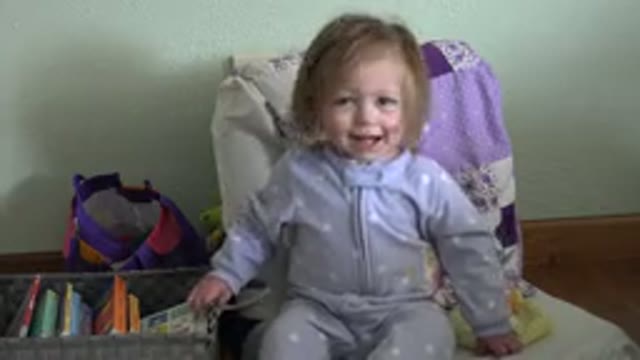 WESTMINSTER COLORADO-2016: A Cute Little Toddler Shaking Her Head And Pulling A Basket