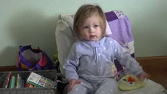 WESTMINSTER COLORADO-2016: A Cute Toddler Sitting On A Chair And Shaking Head Playfully