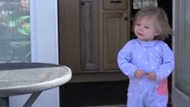 WESTMINSTER COLORADO-2016: Toddler In Blue Dress Comes Out Of The Room Into The Sunlight