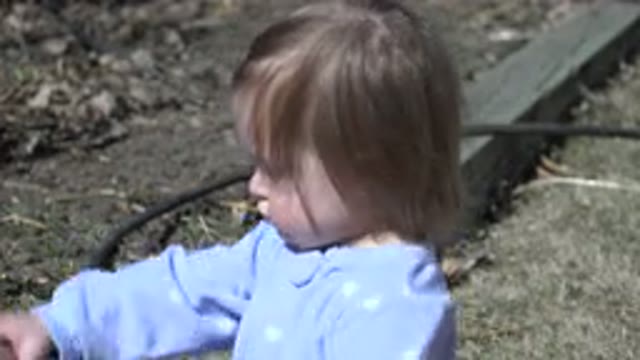 WESTMINSTER COLORADO-2016: A Child Playing With A Stone In The Background A