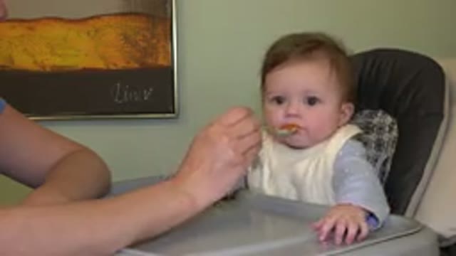 WESTMINSTER COLORADO-2015: Parent Feeding Child Who Is Sitting Safe Inside