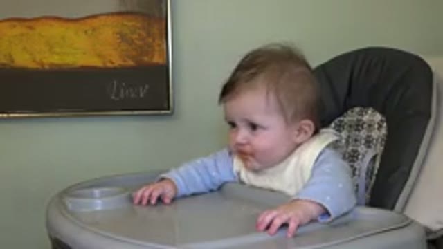 WESTMINSTER COLORADO-2015: Baby Making Mess While Eating Mother Cleaning Up Baby