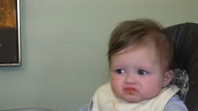 WESTMINSTER COLORADO-2015: A Cute Little Toddler Seating On A High Chair And Feeding