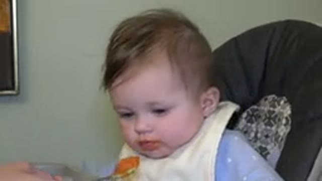 WESTMINSTER COLORADO-2015: Parent Trying To Feed His Child With A Spoon And