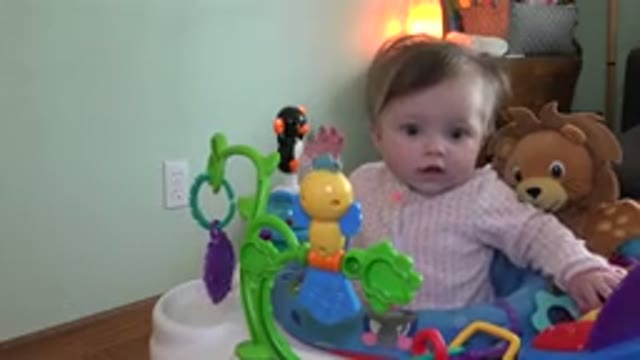 WESTMINSTER COLORADO-2015: Cute Baby Girl Sits On Walker And Plays With Toys