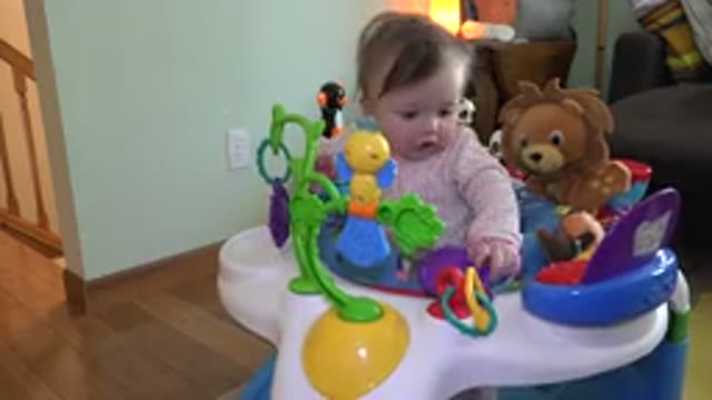 WESTMINSTER COLORADO-2015: Little Girl Playing With Her Very Colorful Walker And
