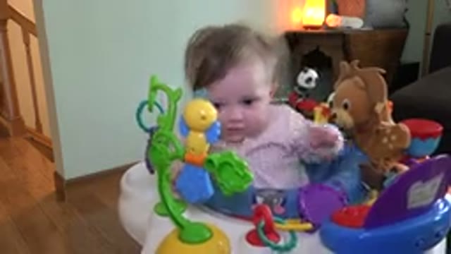 WESTMINSTER COLORADO-2015: Infant Playing In A Baby Walker