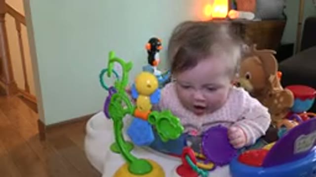 WESTMINSTER COLORADO-2015: Baby Having Fun At Home With His Toys In The Car Seat