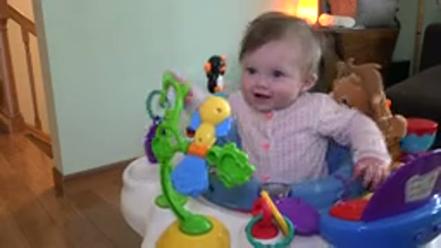WESTMINSTER COLORADO-2015: A Baby Playing In His Stroller With Lots Of Toys