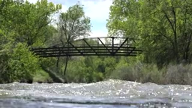 WESTMINSTER COLORADO-2015: Still Footage Of A Stream And A Old Metal Bridge On A