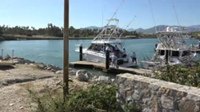 PLAYITA BCS MEXICO-2017: A Group Of People Preparing To Sail On The Water On A