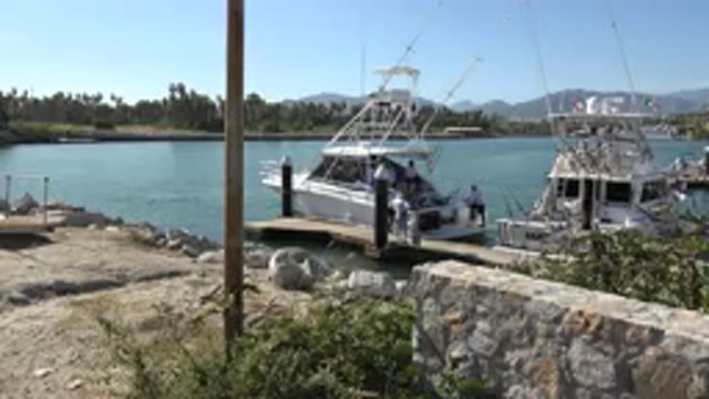 PLAYITA BCS MEXICO-2017: A Ship Packed By The River Bank With People On It