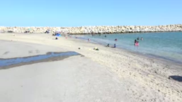 PLAYITA BCS MEXICO-2017: Beach With Calm Tide And Many People Enjoying The Water