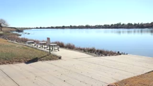 HIDDEN LAKE COLORADO-2017: A Boat Launch On A Lake Or River Next To A Path With