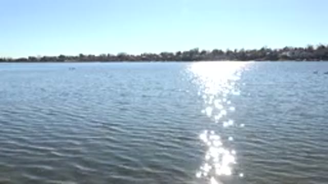 HIDDEN LAKE COLORADO-2017: Reflection Of The Sea Light Over A Very Peaceful Sea