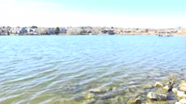 HIDDEN LAKE COLORADO-2017: Sunny Day And The Waterfront Lake Blowing In The Wind