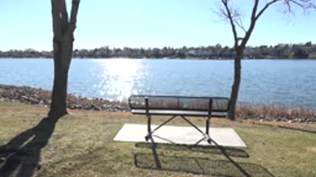 HIDDEN LAKE COLORADO-2017: A View Of A Bench That Is Right In Front Of A River