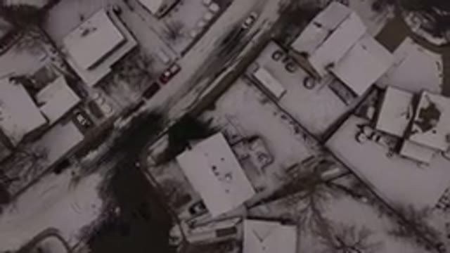 JEFFERSON COUNTY COLORADO-2015: Aerial View of Road Passing Through Snow-Covered Neighborhoods and Industrial Zones