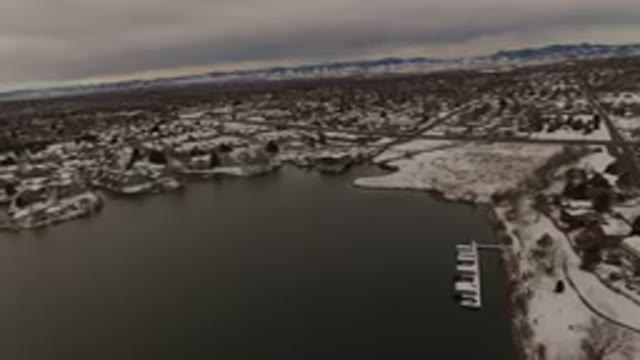 JEFFERSON COUNTY COLORADO-2015: Flight Over A Body Of Water At Winter Showing