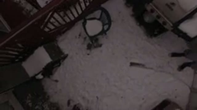 JEFFERSON COUNTY COLORADO-2015: Area Of A Snow-Covered House With Chairs And A Person