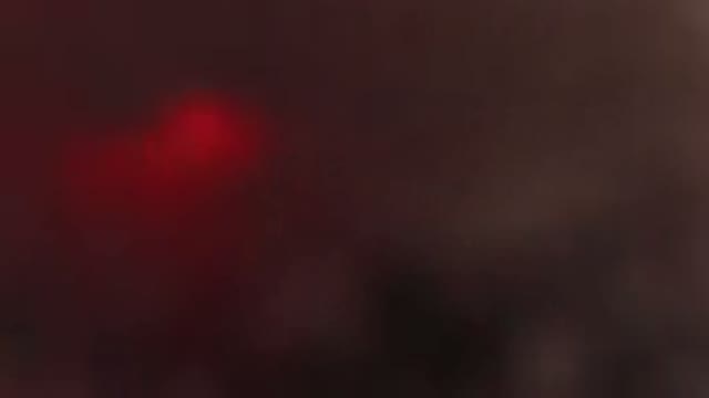 JEFFERSON COUNTY COLORADO-2015: A Red Dot Like a Light Appearing on a Dark Cloud