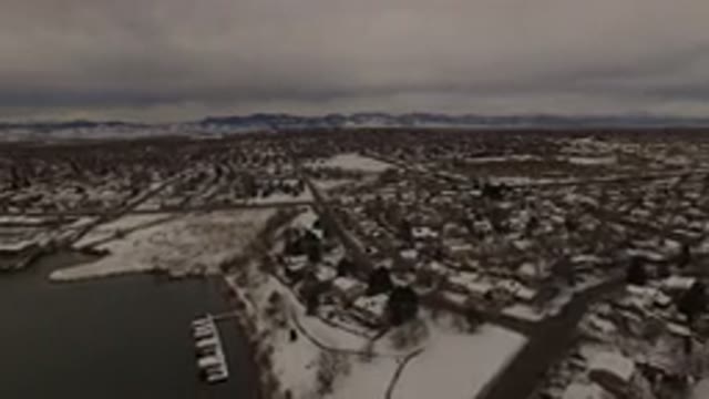JEFFERSON COUNTY COLORADO-2015: Hillside View Of A Lakeside Town That Has Been Snowed In