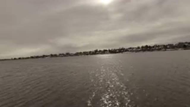 JEFFERSON COUNTY COLORADO-2015: Sailing On Dark Water River Towards The Bank And