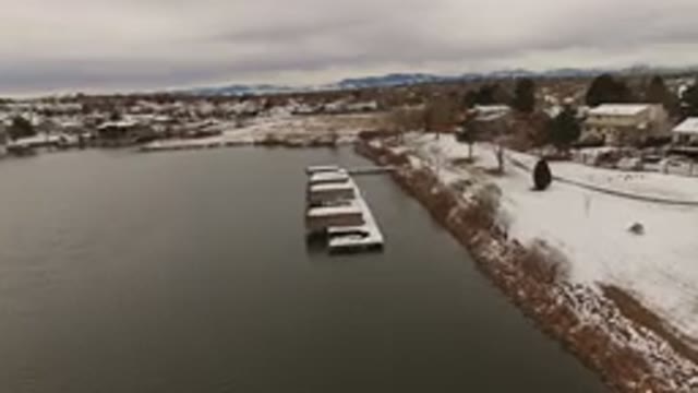 JEFFERSON COUNTY COLORADO-2015: Camera Panning Over A Lake With A Structure