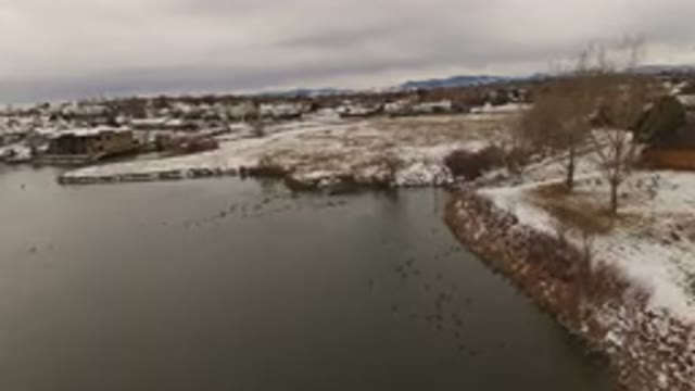 JEFFERSON COUNTY COLORADO-2015: View Of A Cold Lake And Snow Covered Shore