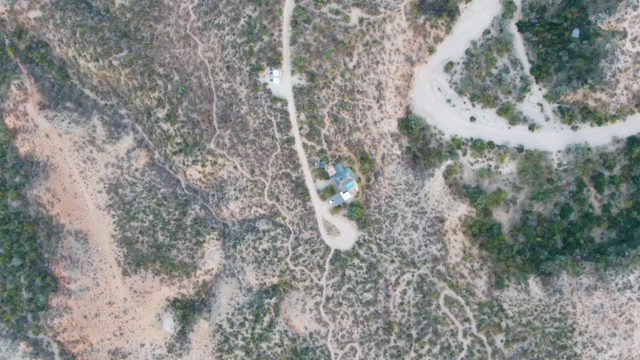 CABO PULMO BCS MEXICO-2023: Vehicle Moving on Arid Hillside Dirt Road