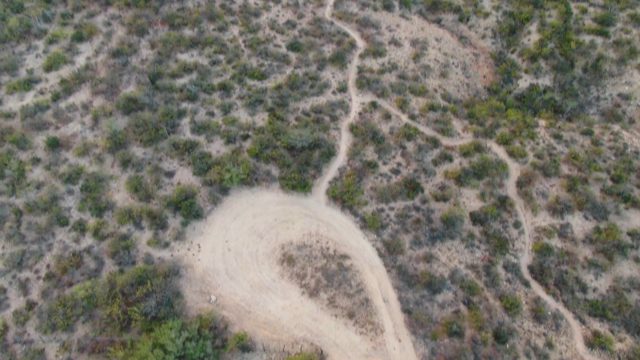 CABO PULMO BCS MEXICO-2023: Aerial Descent over Desert Landscape to a House and Pool