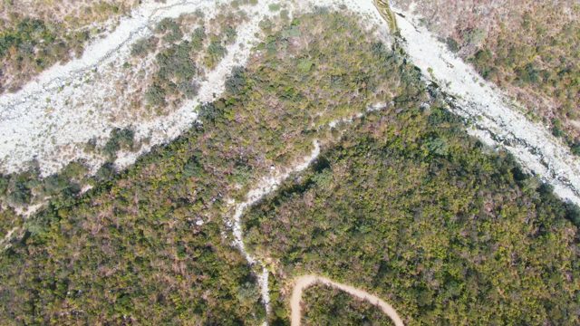 SAN DIONISIO BCS MEXICO-2023: Mountain Ridge with Melting Snow and Forest Path
