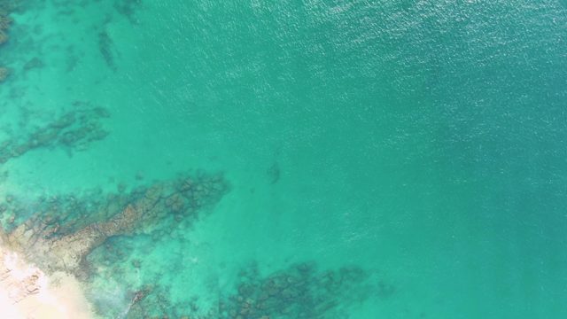 BUZZARDS BEACH EAST CAPE BCS MEXICO-2023: Turquoise Ocean Water Over Sandy Shore and Rocks