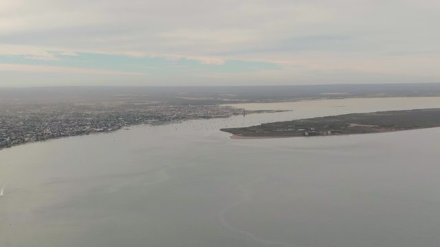 LA PAZ BCS MEXICO-2023: Coastal City and Sailboats Moving on Water