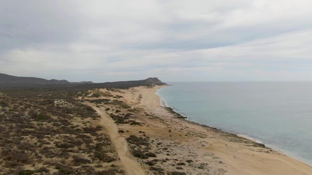 PUNTA GORDA BEACH BCS MEXICO-2023: Sandy Beach and Ocean Along a Winding Dirt Path