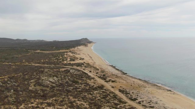 PUNTA GORDA BEACH BCS MEXICO-2023: Sandy Coastline with Ocean and Hillside