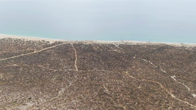 PUNTA GORDA BEACH BCS MEXICO-2023: Vehicle Moving Along Sandy Beach and Dunes